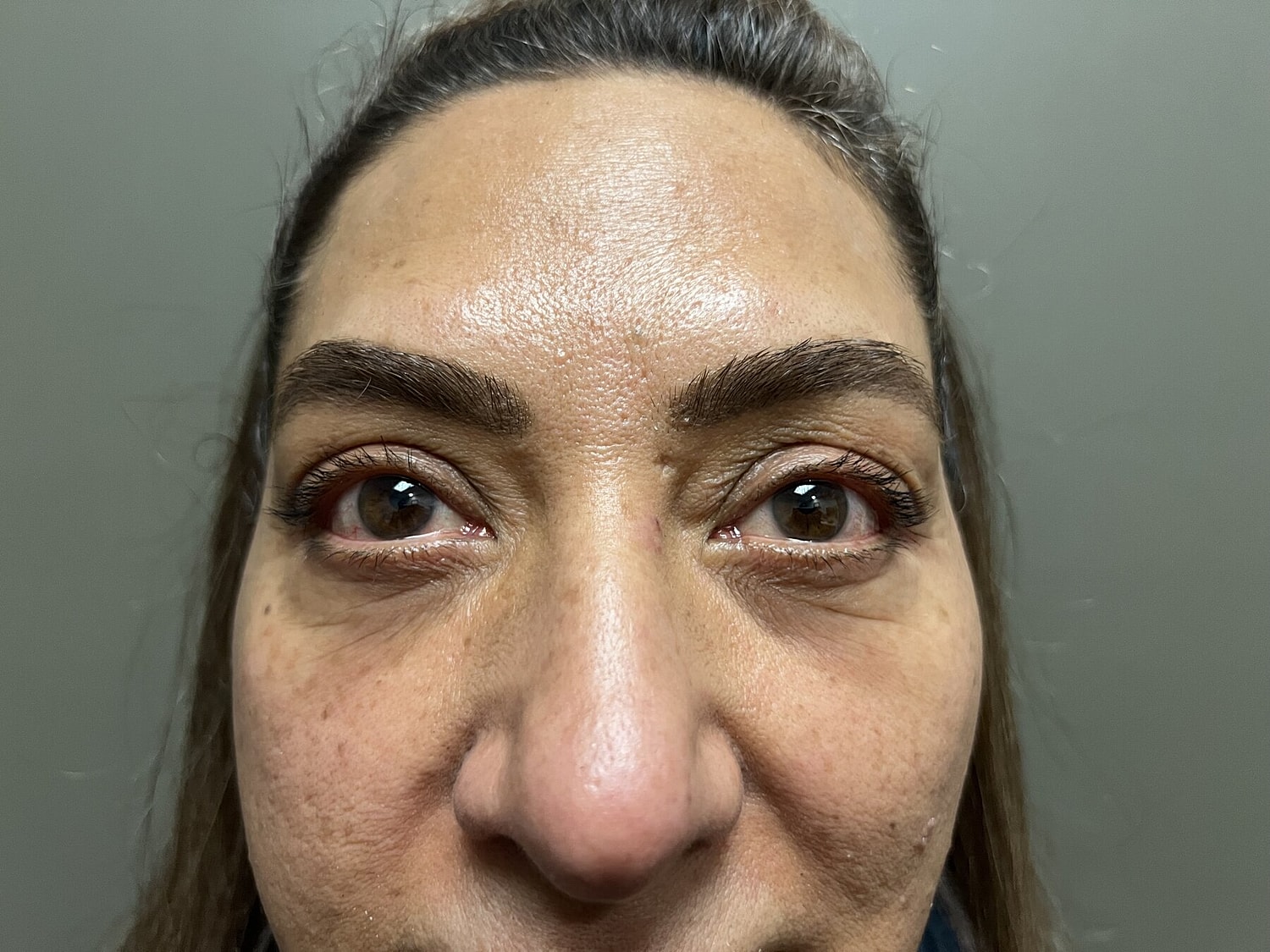 Close-up of a woman's face and eyes.